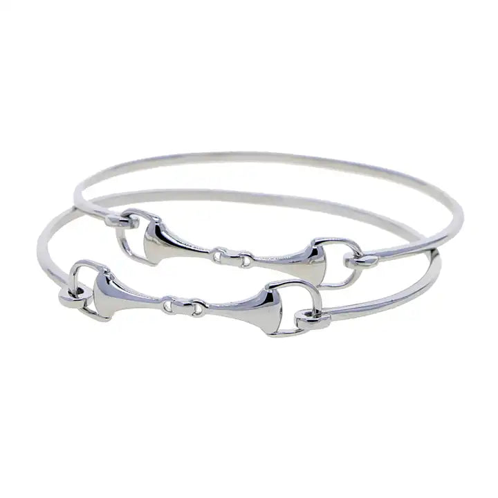 ilver snaffle bit bangle bracelets with equestrian-inspired design and polished finish.