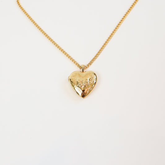 Floral Bow Locket with engraved heart pendant on a gold-tone chain