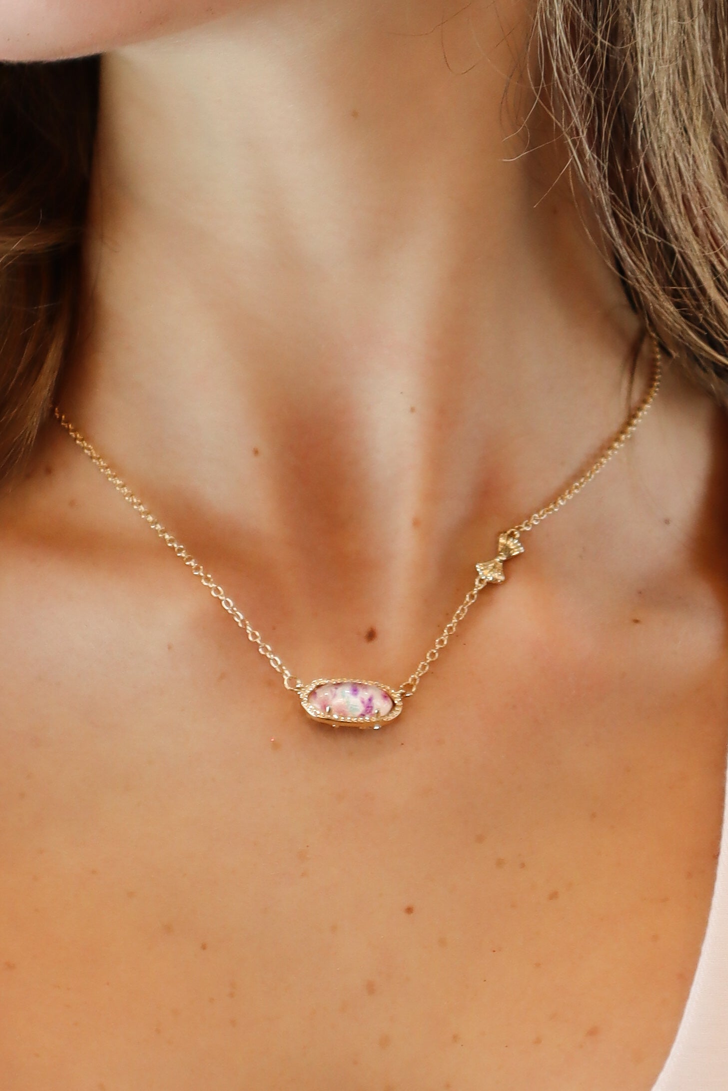 Revesible floral bow pendant lifestyle