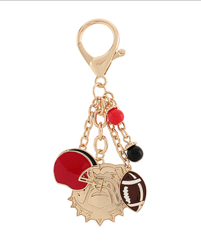 Gold football charm keychain with red helmet, bulldog emblem, and enamel accents on gold chain — perfect for game day or sports fans.
