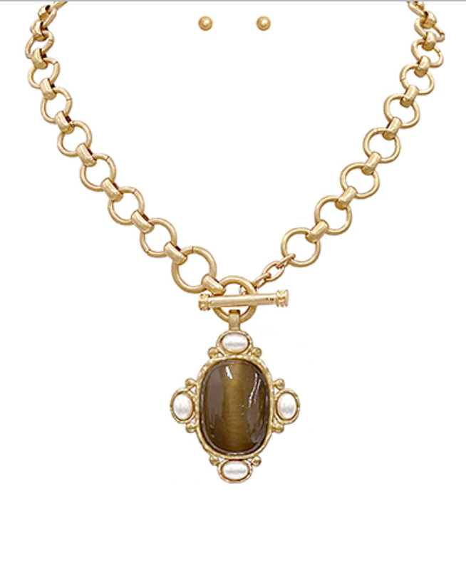 Gold chain necklace with oval Brown Gemstone pendant surrounded by faux pearls