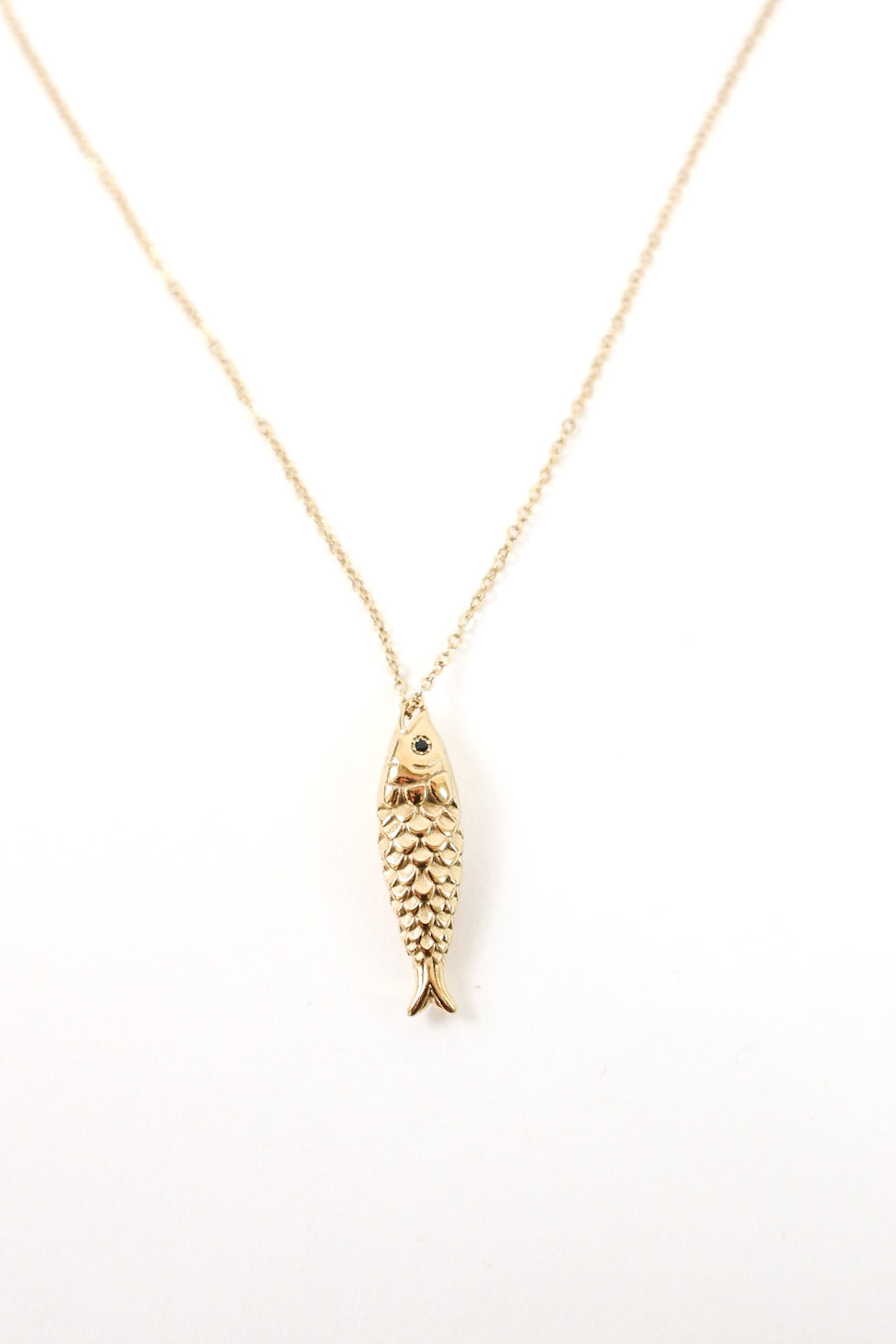 Ocean-inspired gold fish pendant necklace
