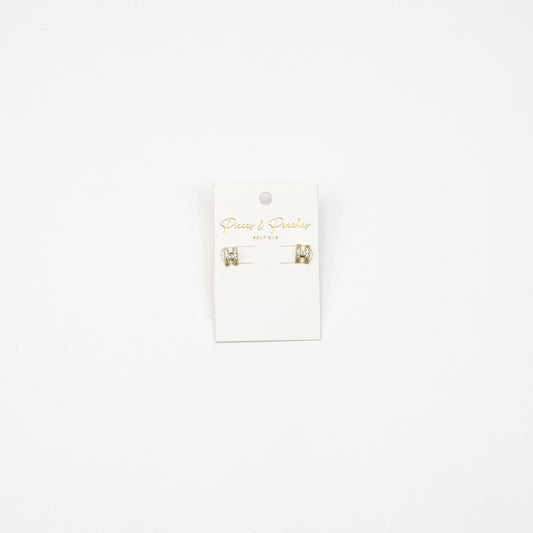 Gold H-shaped stud earrings with cubic zirconia accents, featuring a minimalist yet elegant design for everyday wear