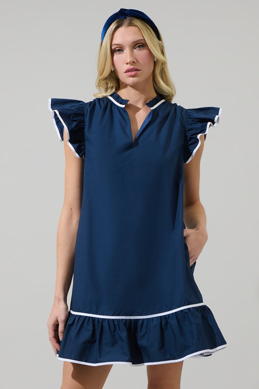 A navy blue shift dress featuring flutter sleeves with white trim, a split neckline, and a ruffle hem, designed for a polished yet effortless look.