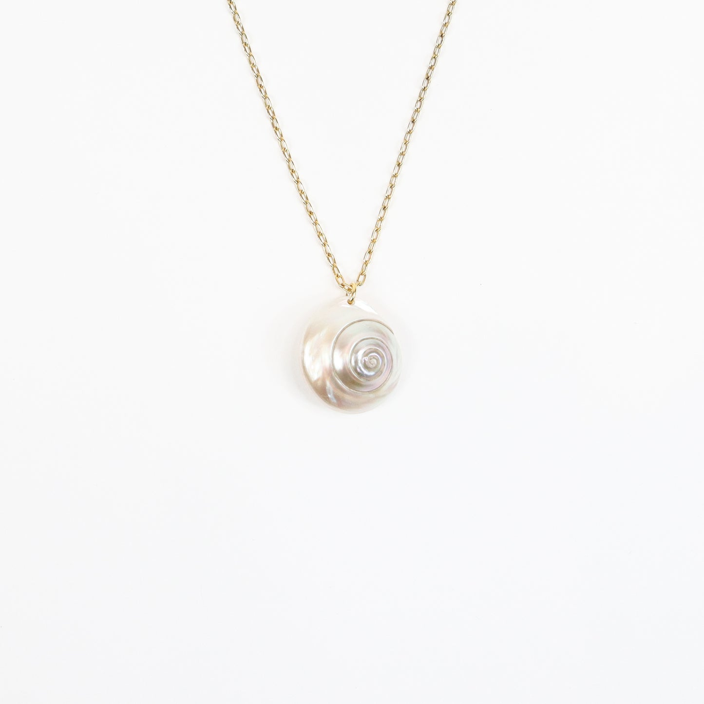 A handcrafted 22K gold-plated necklace featuring a genuine iridescent shell pendant, suspended on a delicate gold chain, radiating soft pearlescent hues for a natural, coastal-inspired look.