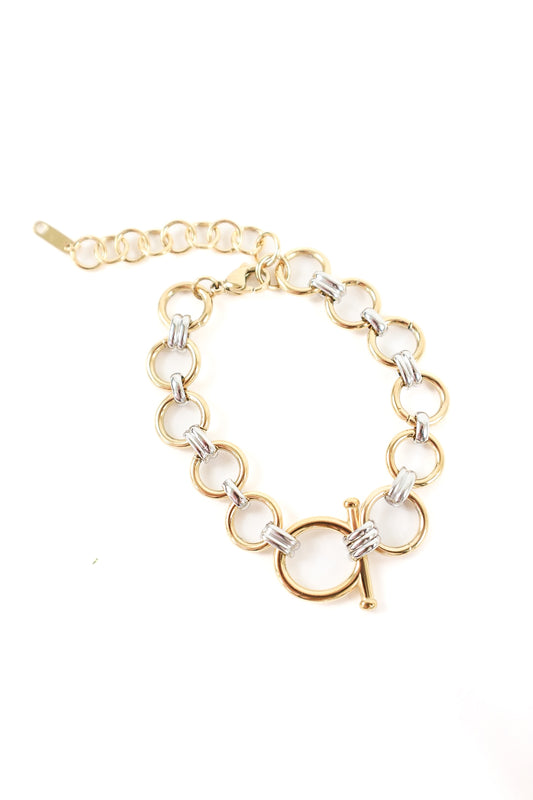 Gold and silver mixed-metal chain bracelet featuring round links and a toggle clasp