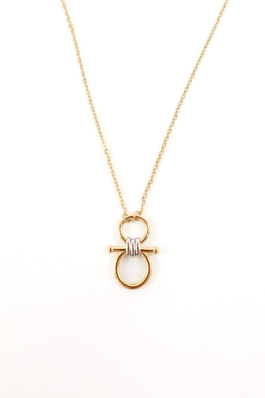 Gold pendant necklace featuring interlocking rings with a knot detail and delicate chain