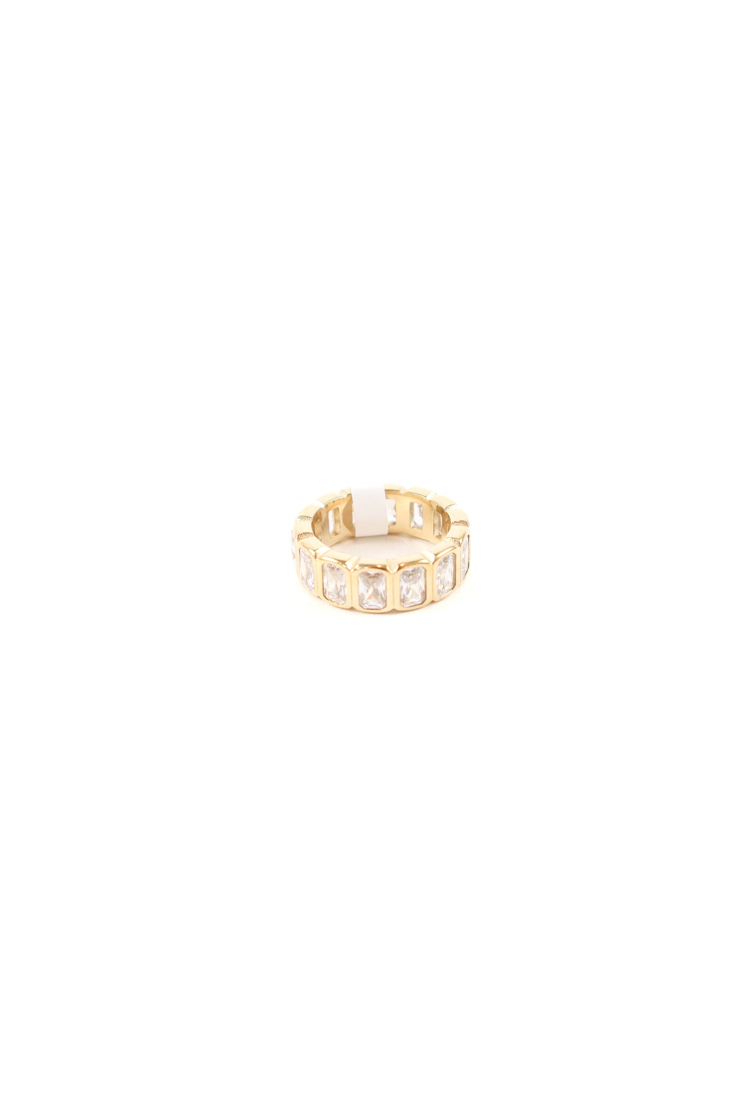 Bold gold eternity band with radiant-cut cubic zirconia stones set in a structured rectangular gold frame, polished high-shine finish