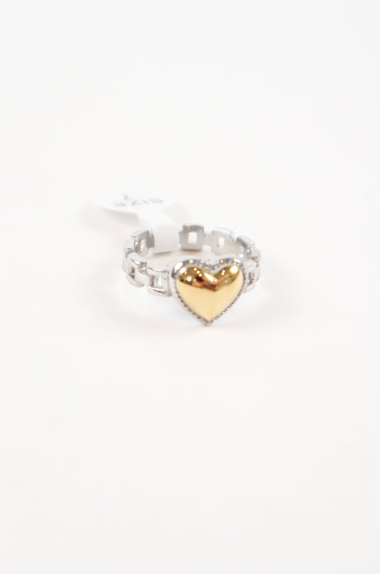 Two-tone heart ring featuring a polished gold heart centerpiece on a silver-tone band with sparkling cubic zirconia accents