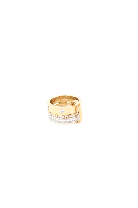 Mixed metal buckle-style ring featuring gold and silver bands with pavé crystal accents