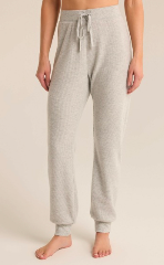 Light heather grey thermal knit joggers with a drawstring waistband and ribbed cuffs, designed for ultimate comfort and casual style.