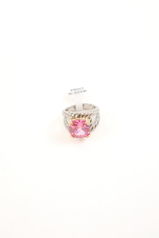 Cushion-cut statement ring with gold prongs and textured silver band