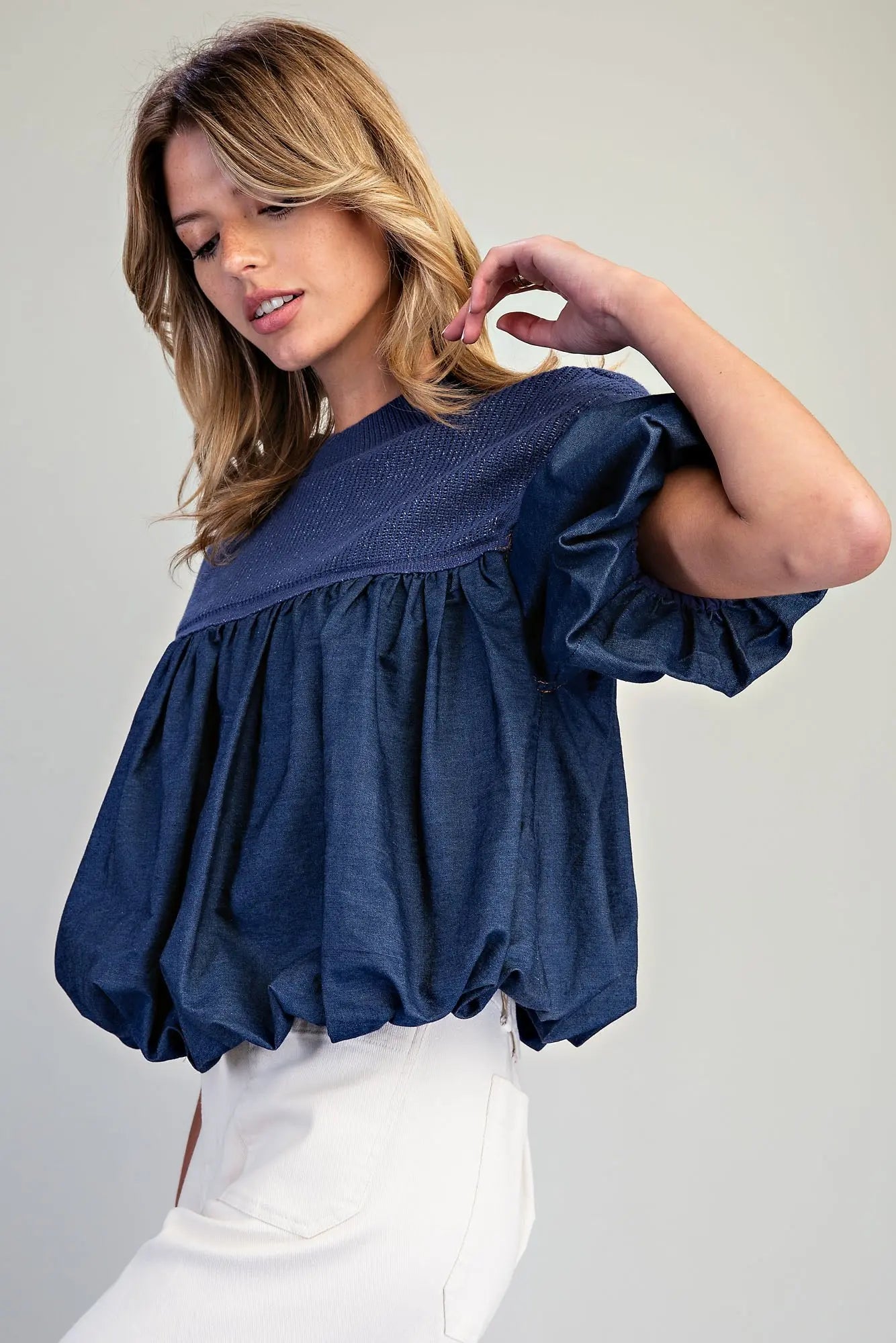 Cecily Knit Yoke Denim Bubble Top featuring a ribbed knit crewneck yoke, cotton chambray-style bodice, dramatic bubble sleeves, and gathered balloon hem