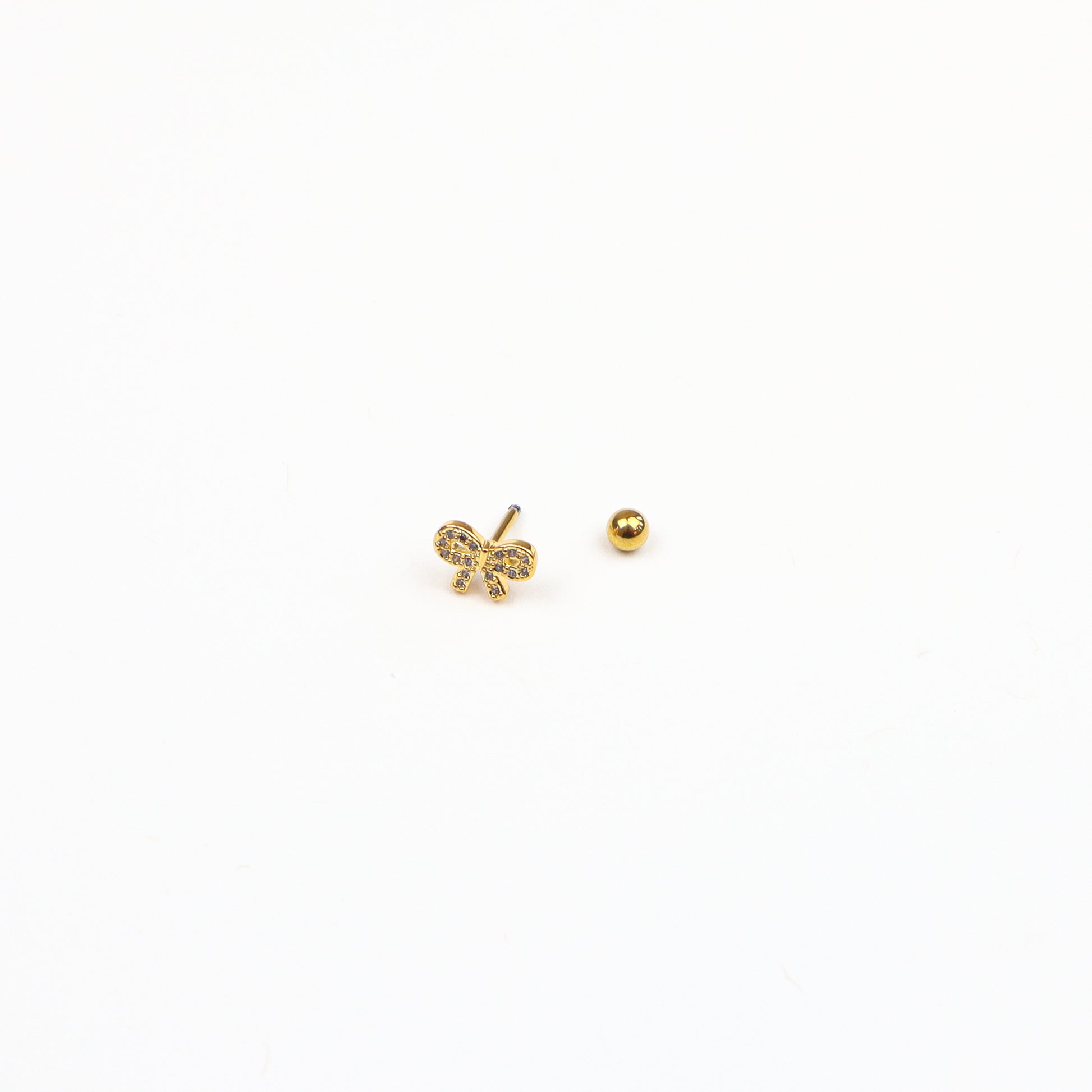 Dainty gold bow stud earrings with cubic zirconia accents