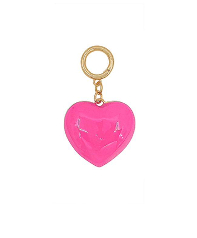 Pink enamel heart charm with gold clasp on white background — stylish heart pendant accessory.