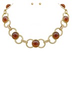 The Calantha Amber Link Necklace Set adds warm vintage charm with modern gold accents.