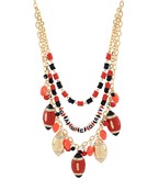 The Selah Layered Pave Football Necklace scores big on sparkle with sporty-chic style.