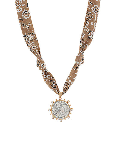 The Rowena Brown Coin Scarf Choker fuses boho charm with a rich, earthy hue for an effortlessly chic accent.