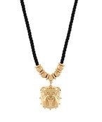The Isolde Bulldog Black Pendant Necklace adds a bold, spirited touch to your look with its charming mascot-inspired design.