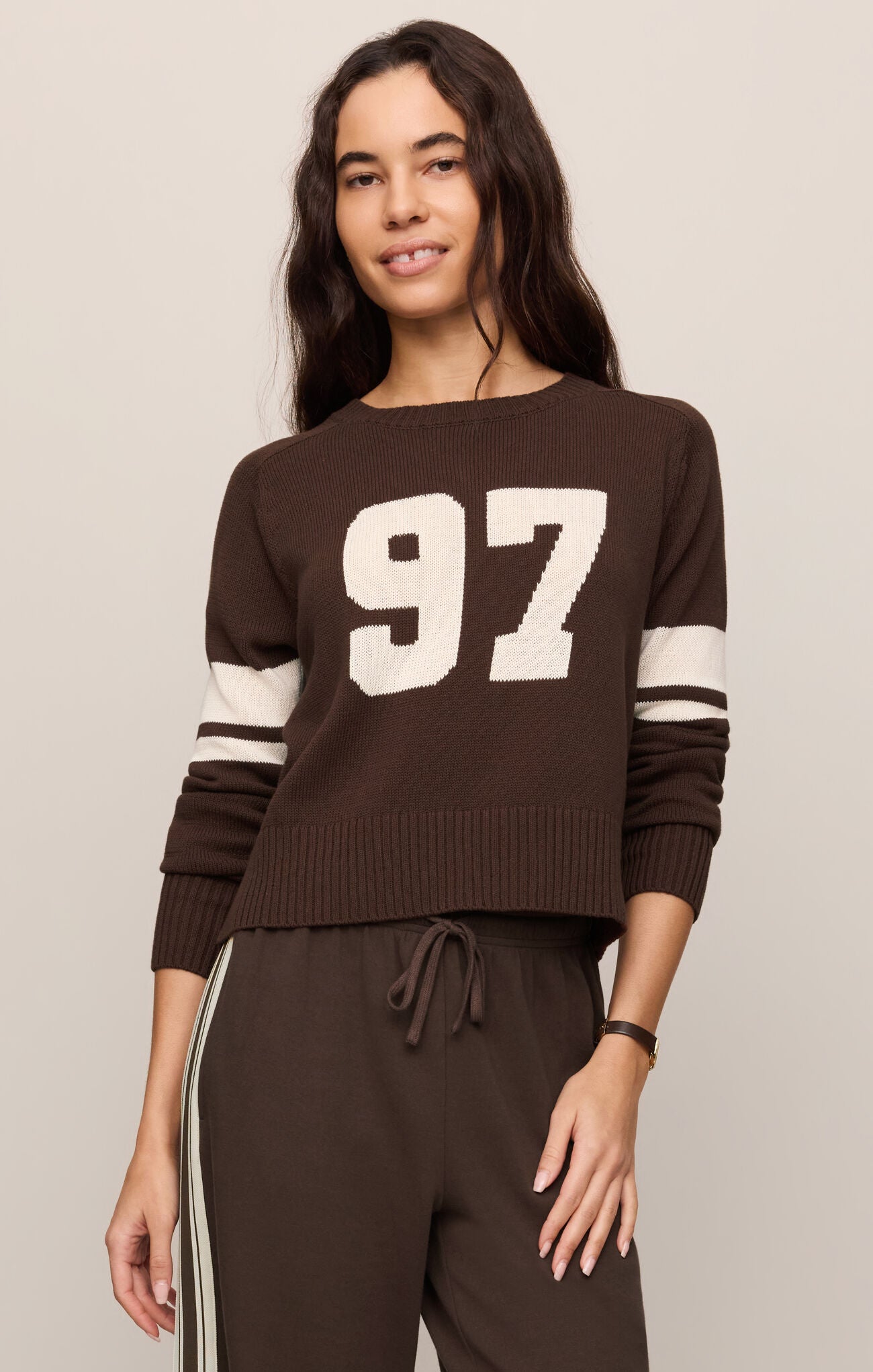 A timeless 100% cotton crewneck sweater designed with a lightweight knit and effortless silhouette for everyday comfort and classic style.