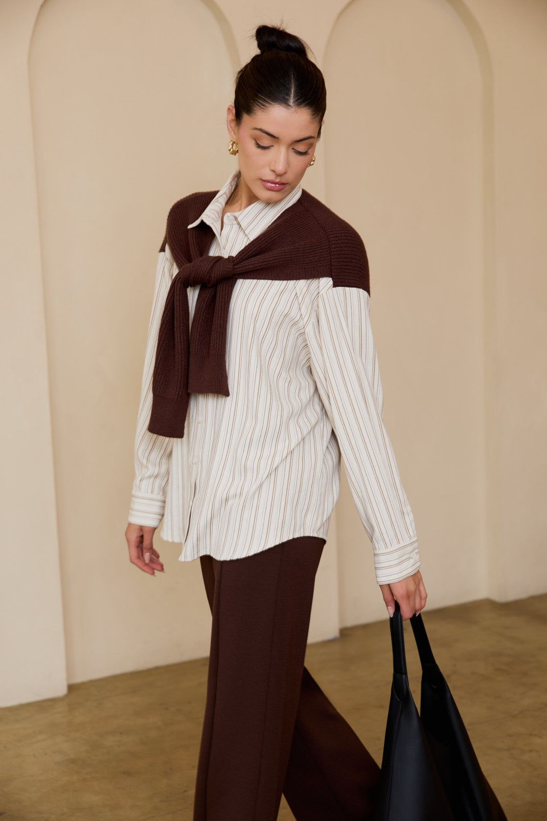 Oversized woven and knit mixed shirt with relaxed structure and soft texture.