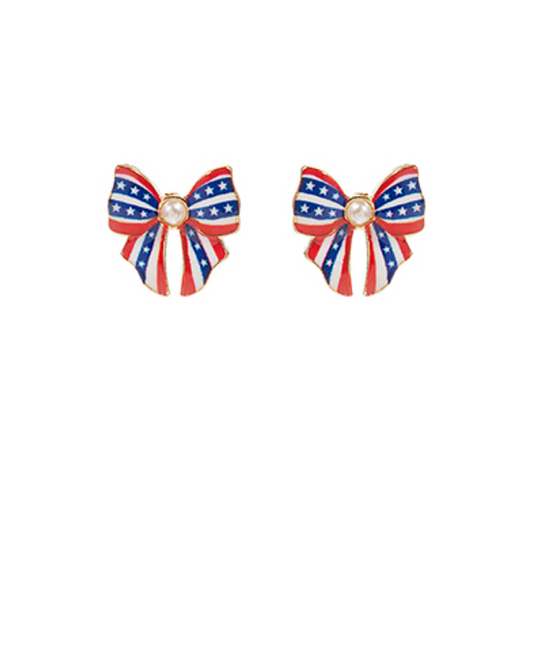 Pair of stud earrings shaped like bows, featuring a design with red and white stripes, blue sections with white stars, and a faux pearl in the center.
