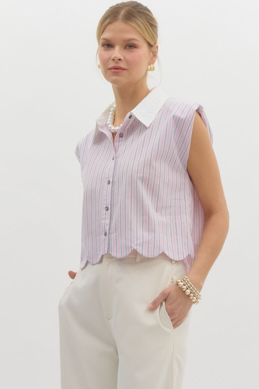 Pinstriped structured shoulder sleeveless top featuring scalloped hem. Classic collared front butto closure. Unlined. Woven. Non-sheer. Lightweight.
