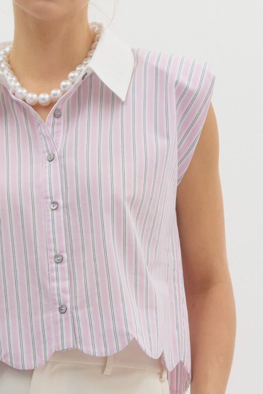 Pinstriped structured shoulder sleeveless top featuring scalloped hem. Classic collared front butto closure. Unlined. Woven. Non-sheer. Lightweight.
