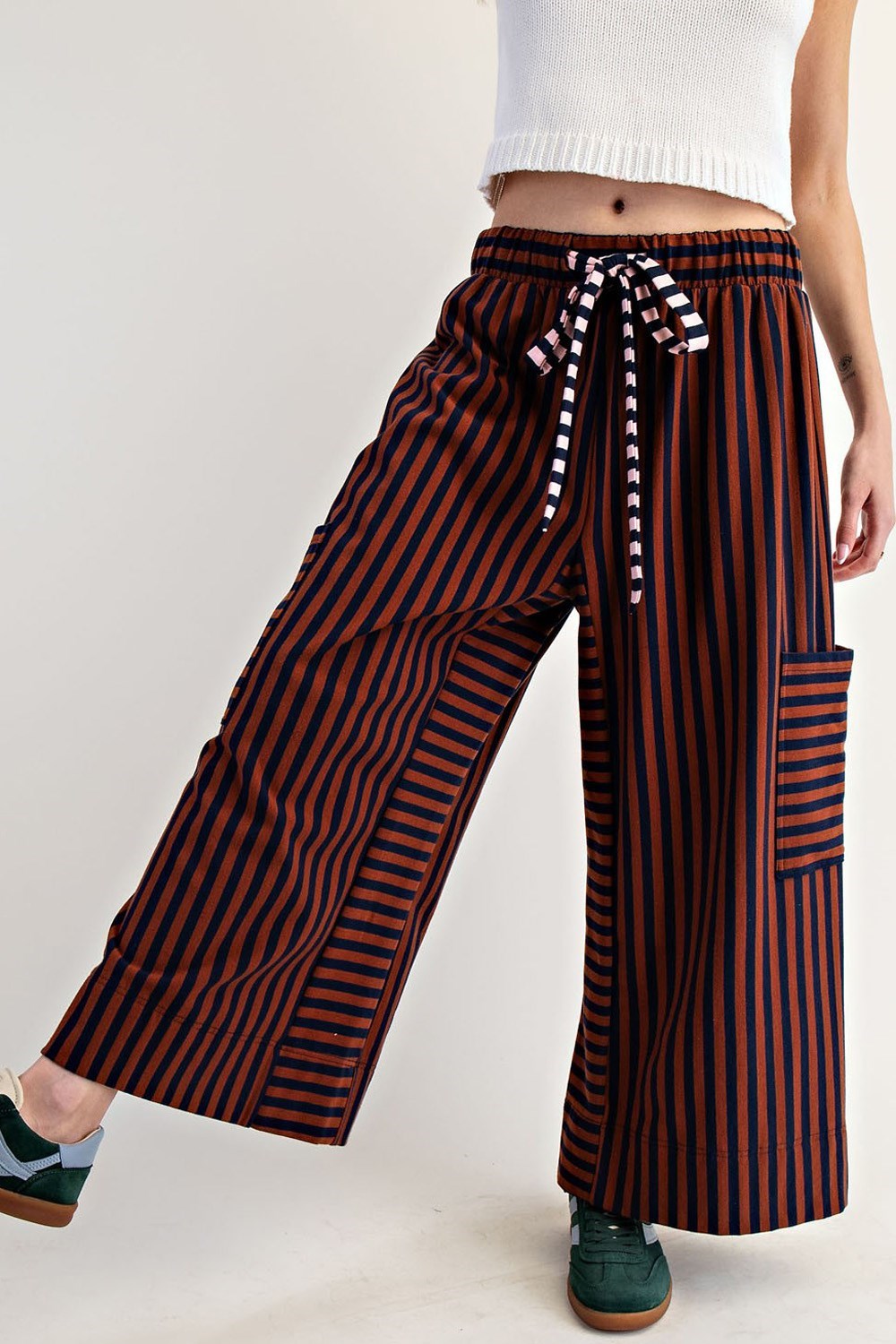 Playful striped wide-leg pants with oversized side pockets.