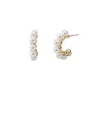 Gold pearl-accented cuff earrings with a modern, structured design