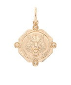 The Ottilie Gold Animal Pendant brings a touch of wild elegance with its sleek, sculpted design.