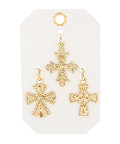 The Coralie Set of Three Gold Cross Pendants offers timeless faith-inspired elegance in a versatile trio.