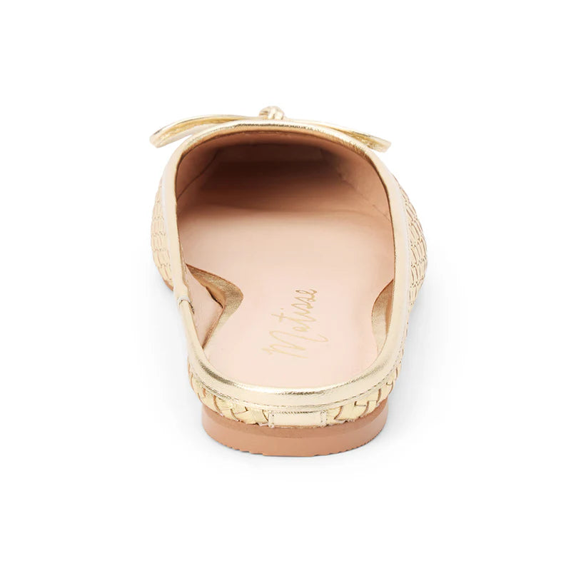 Chic and effortless, these gold woven leather mules bring timeless elegance with a modern twist.