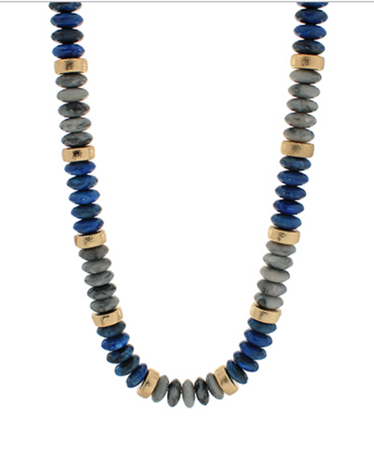 Beaded necklace with navy, grey, and gold beads. 