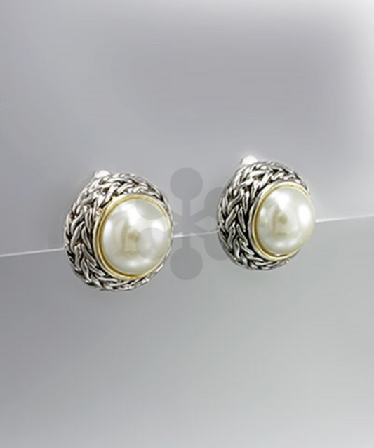 Vintage-inspired faux pearl studs with braided silver-tone detailing and a gold-accented rim, displayed on a neutral grey background.