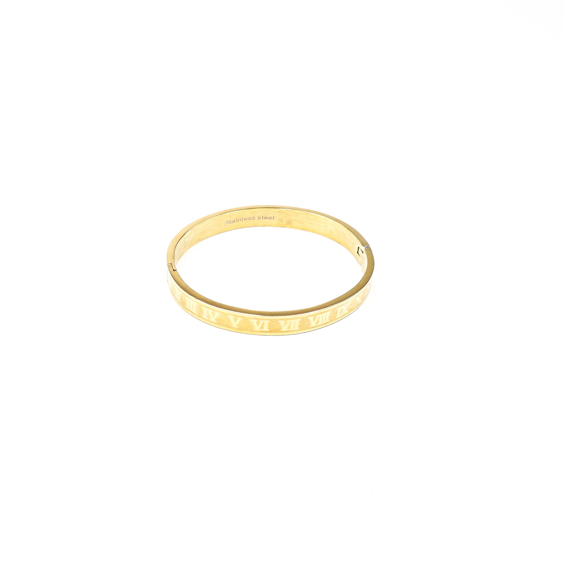 Gold-tone Roman numeral engraved bangle bracelet with a sleek, timeless design, made of stainless steel.