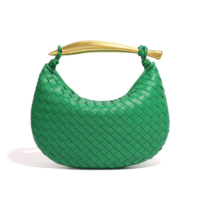 woven leather handbag with a bold gold sculptural handle for a modern, luxury look.