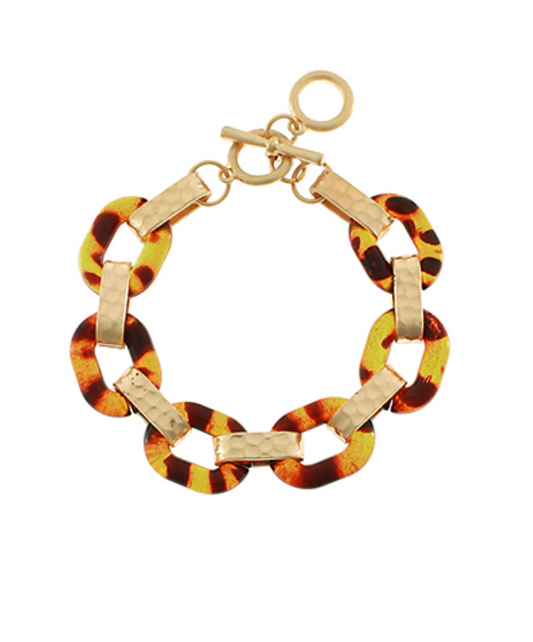 Savannah Link Bracelet featuring alternating tortoiseshell-look resin and hammered gold-tone links with toggle clasp on white background.