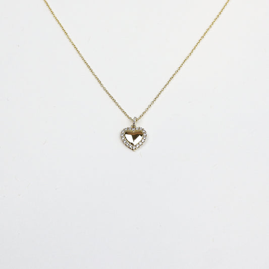A 12mm cubic zirconia heart pendant necklace, crafted from 18K gold-plated 925 sterling silver, featuring a sparkling CZ stone halo—a perfect mix of elegance and modern luxury.

