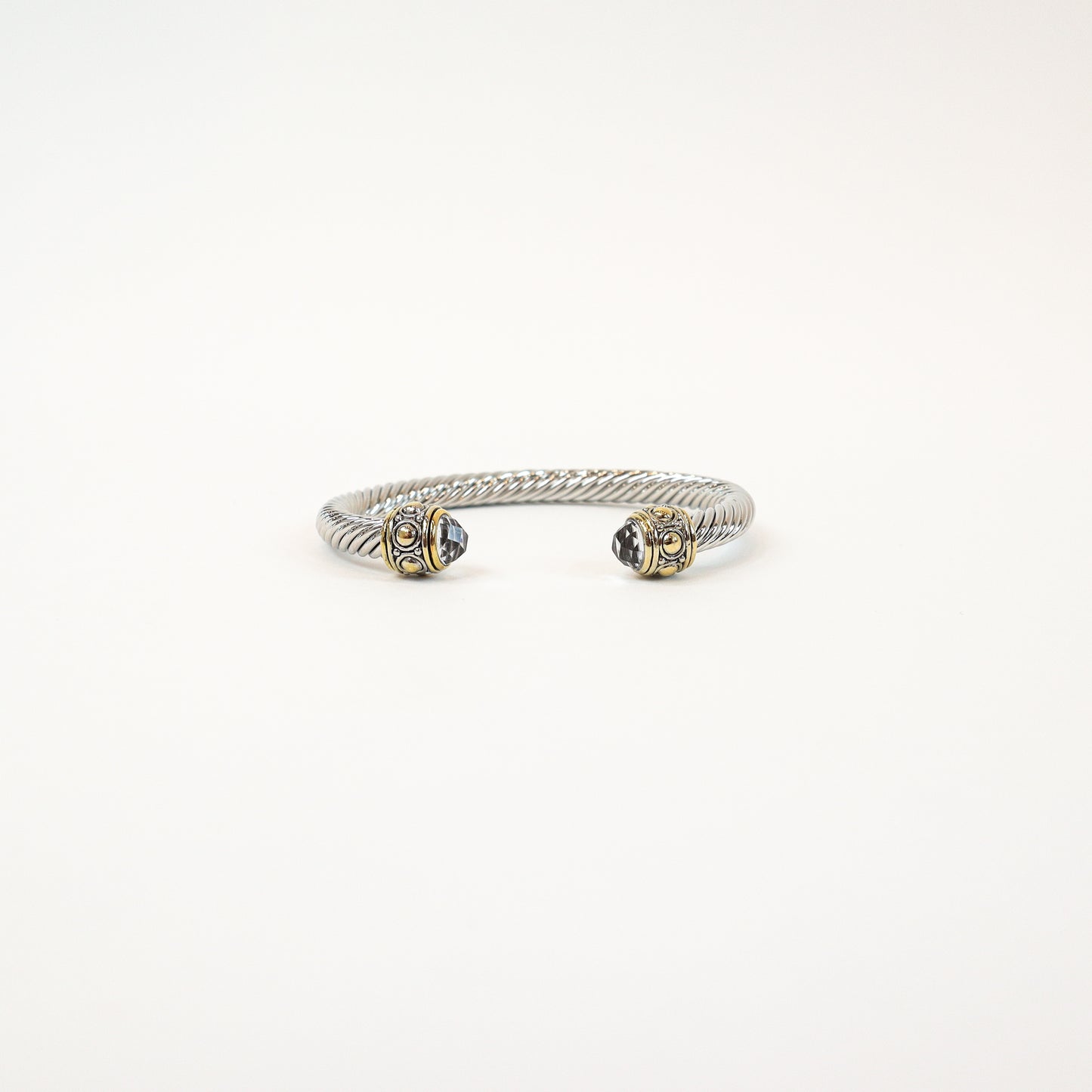 Elegant twisted cuff with intricate detailing
