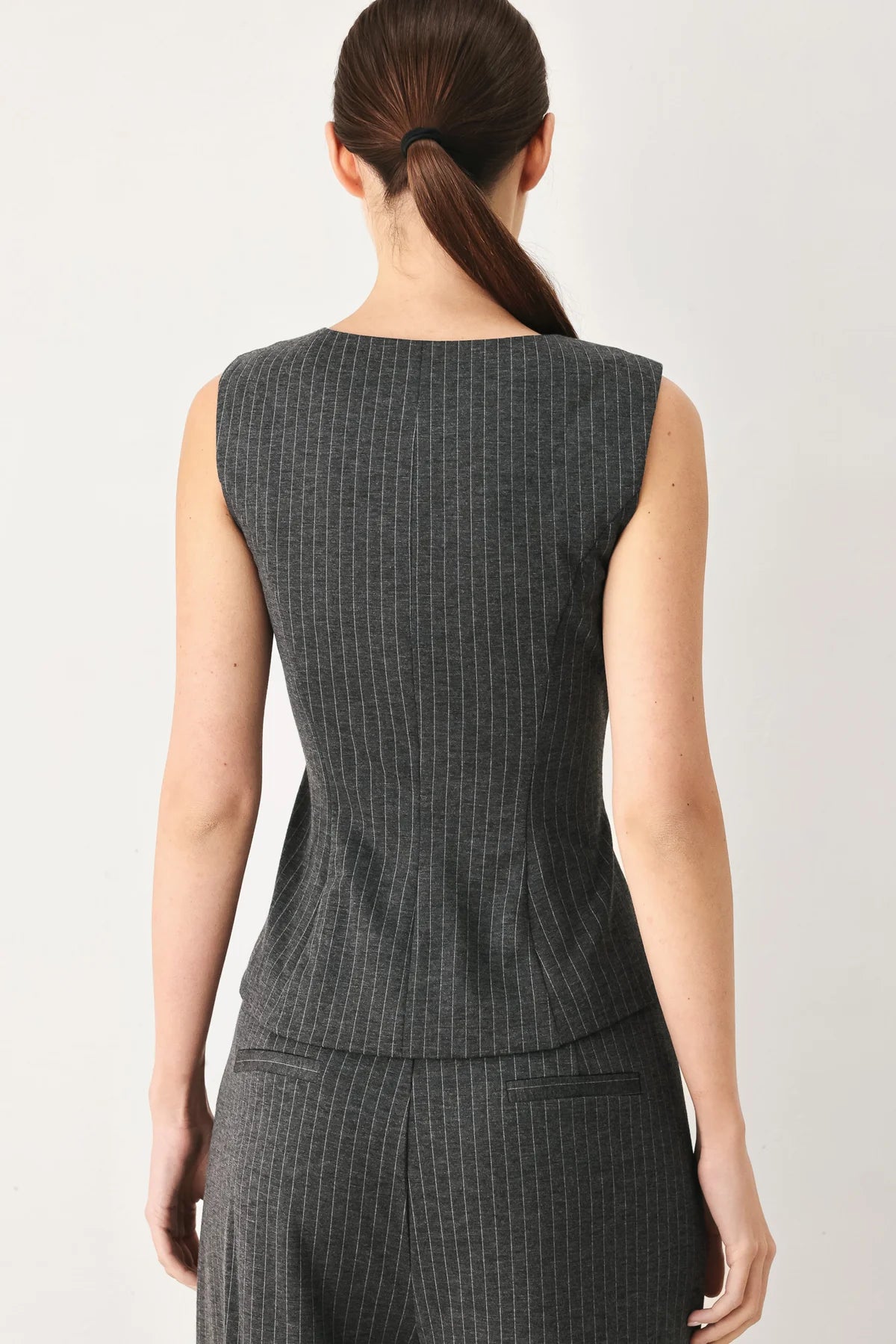 Modern women’s tailored vest styled for business casual outfit