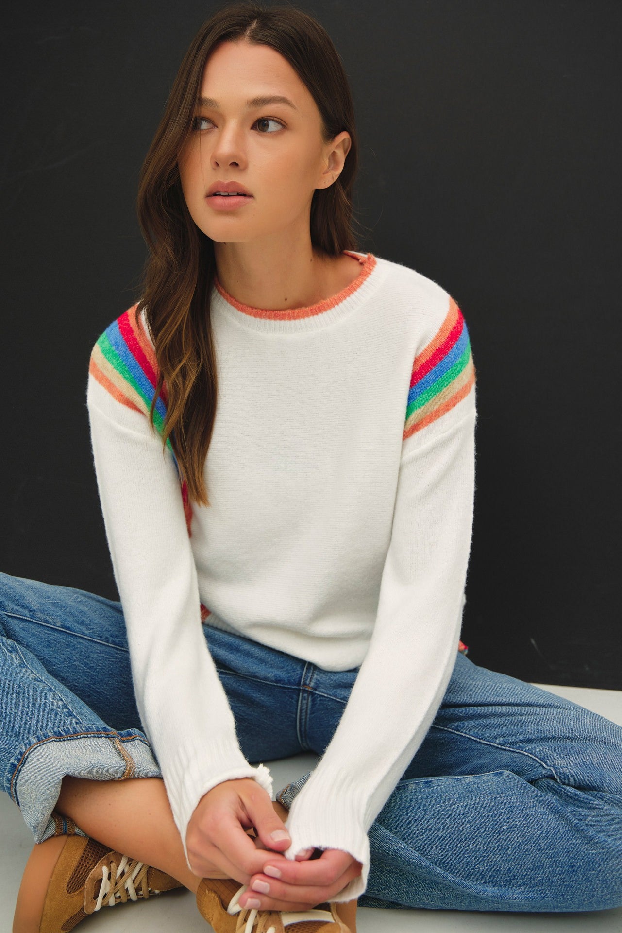 lightweight striped wool blend sweater featuring a soft hand feel, relaxed fit, and vertical rainbow design.