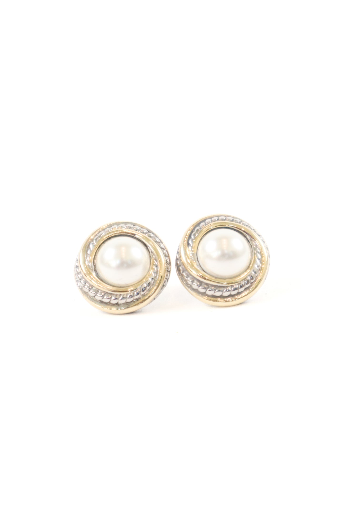 Round pearl stud earrings with mixed gold and silver textured frame