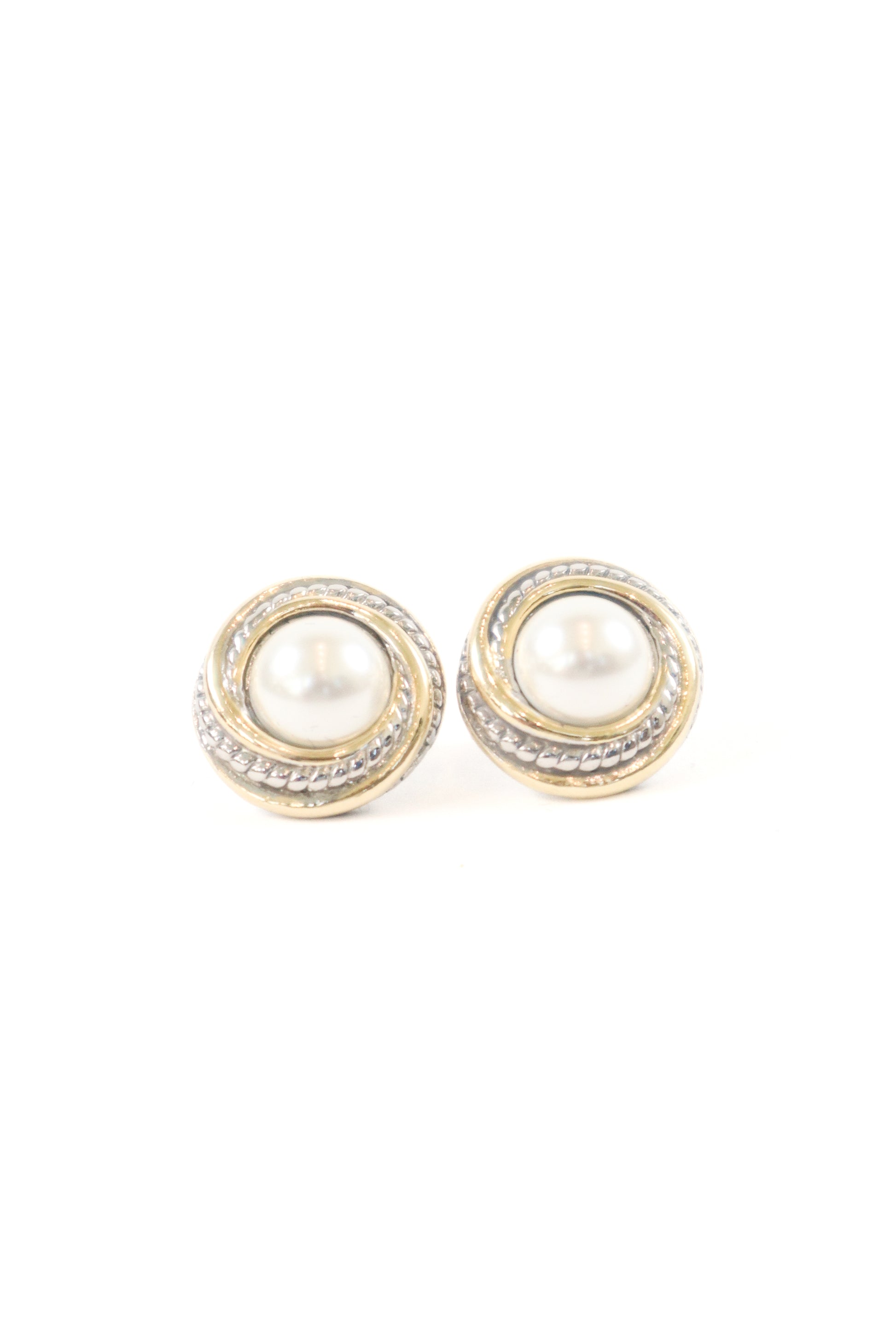 Round pearl stud earrings with mixed gold and silver textured frame