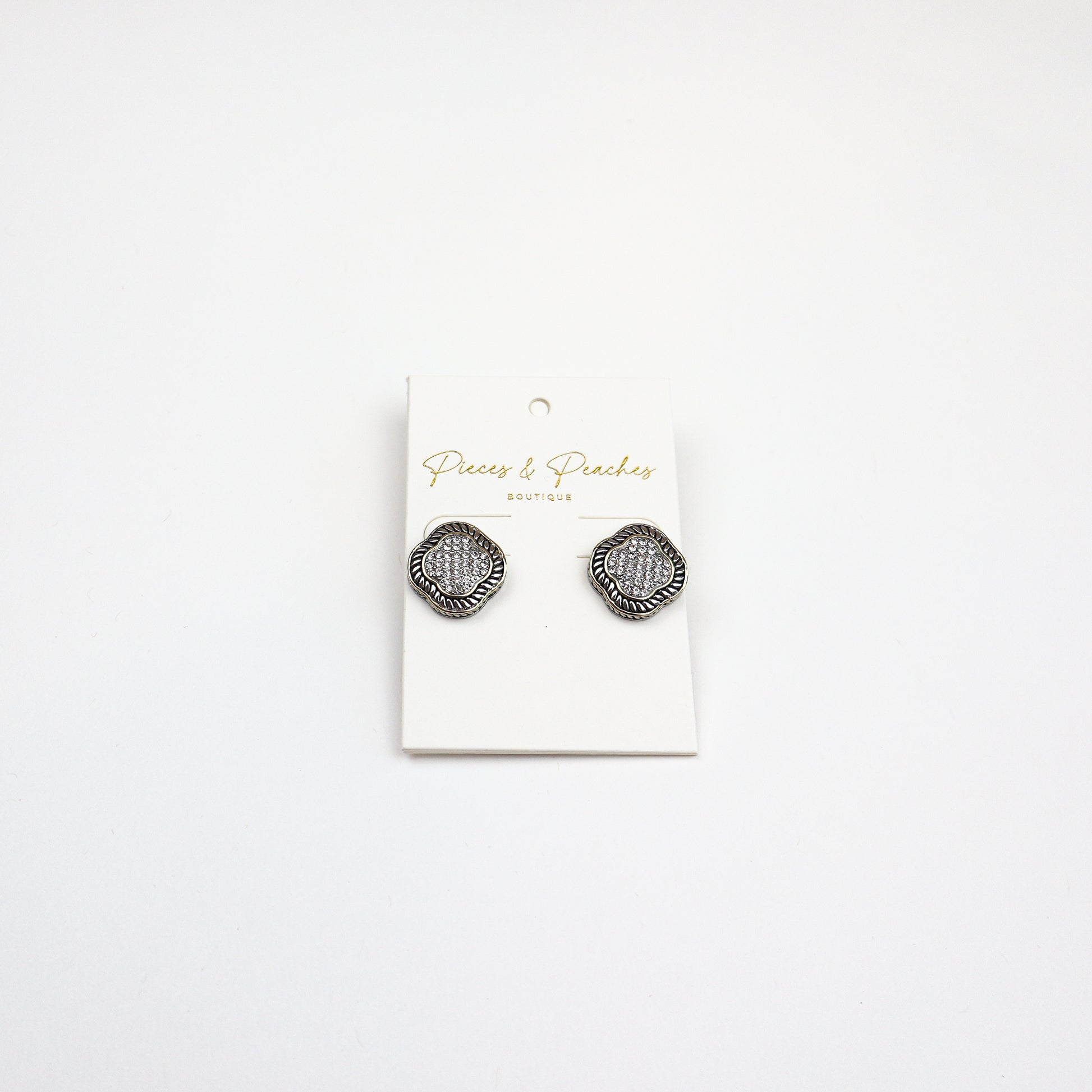 The David CZ Earrings featuring a vintage-inspired silver-tone frame with pave cubic zirconia detailing for a radiant sparkle.