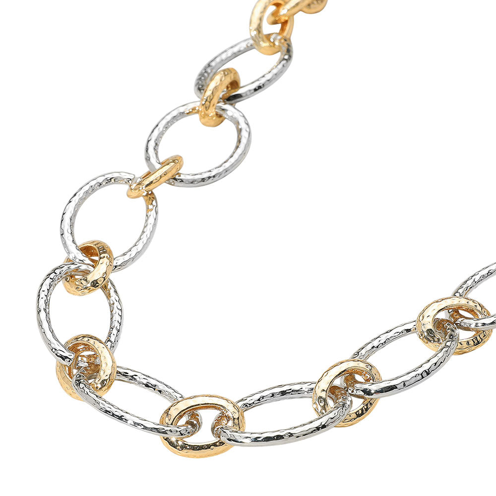 The Beatrix Necklace makes a striking impression with oversized textured oval links—bold, modern, and full of attitude.