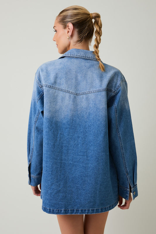 The Corrine Jacket blends vintage embroidery with modern denim tailoring—crafted in a soft cotton-rayon blend for a standout everyday staple.

