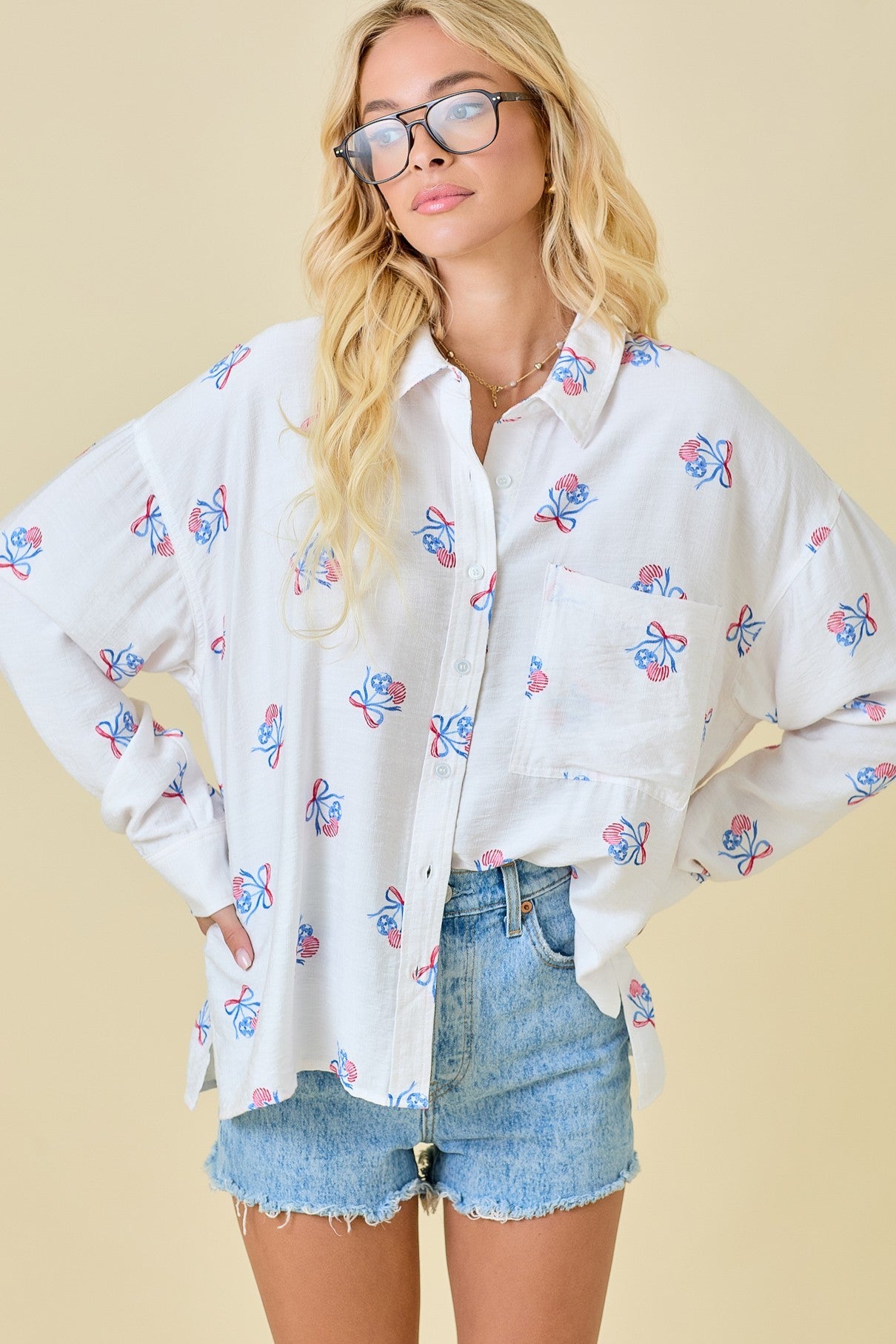 The Darlene Shirt brings bold charm to classic Americana style with cherry-red stripes, a timeless collared design, and an easy, relaxed fit.

