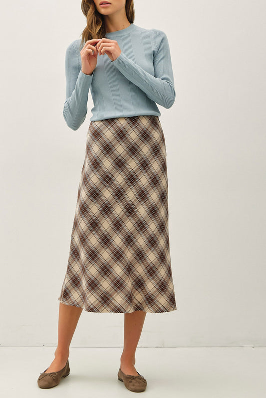 The Della Skirt offers a flattering fit-and-flare silhouette, high-rise comfort, and easy pull-on styling for effortless everyday wear.

