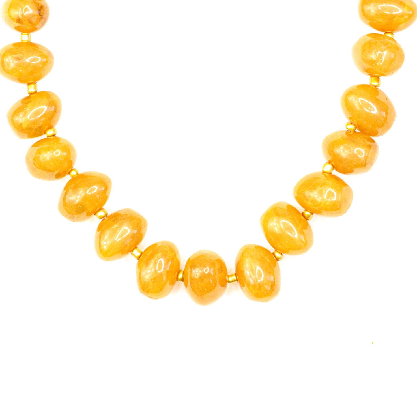 Necklace with yellow beads on a white background